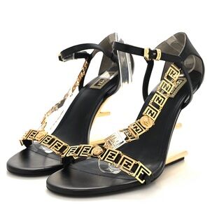 Fendi Black and Gold Heels with Luxurious Accents